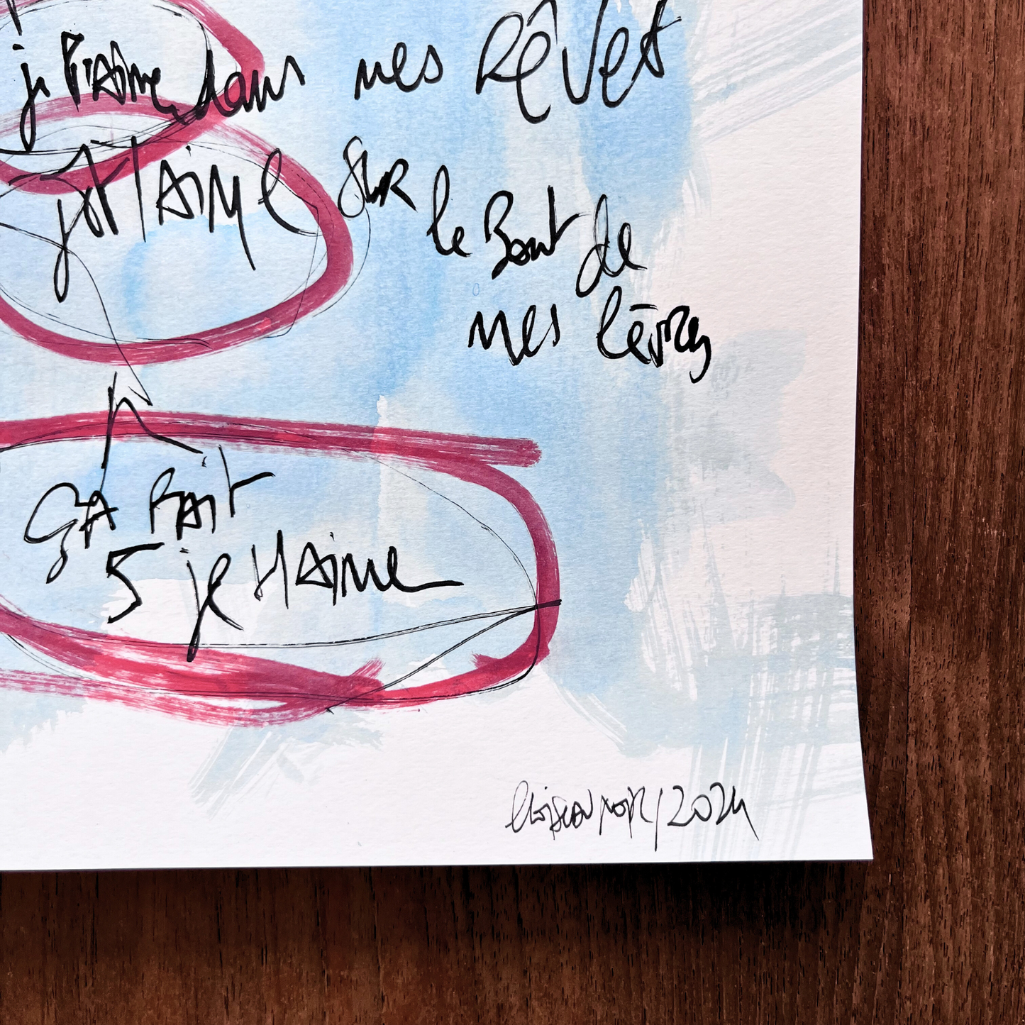 Texte manuscrit "Ça fait 5 je t'aime"