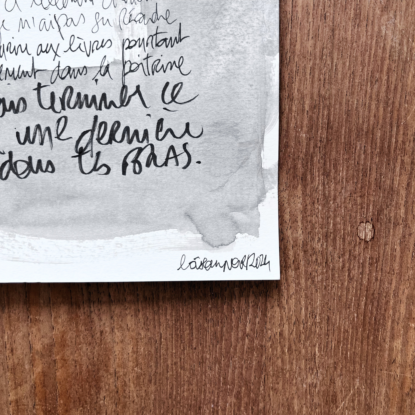 Texte manuscrit "Ce dernier texte comme une dernière fois dans tes bras"